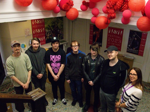 Some of the MINT Young People who took part in the Festival Forever project, with community film maker Lewis Wickwar and MINT Employment Job Coach Kerry Green.     