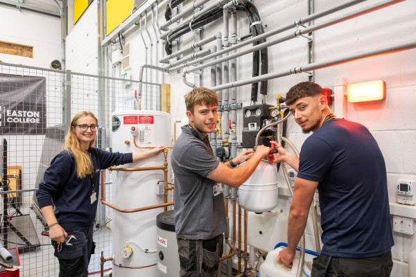 Smiling Heating Technician apprentices at Easton