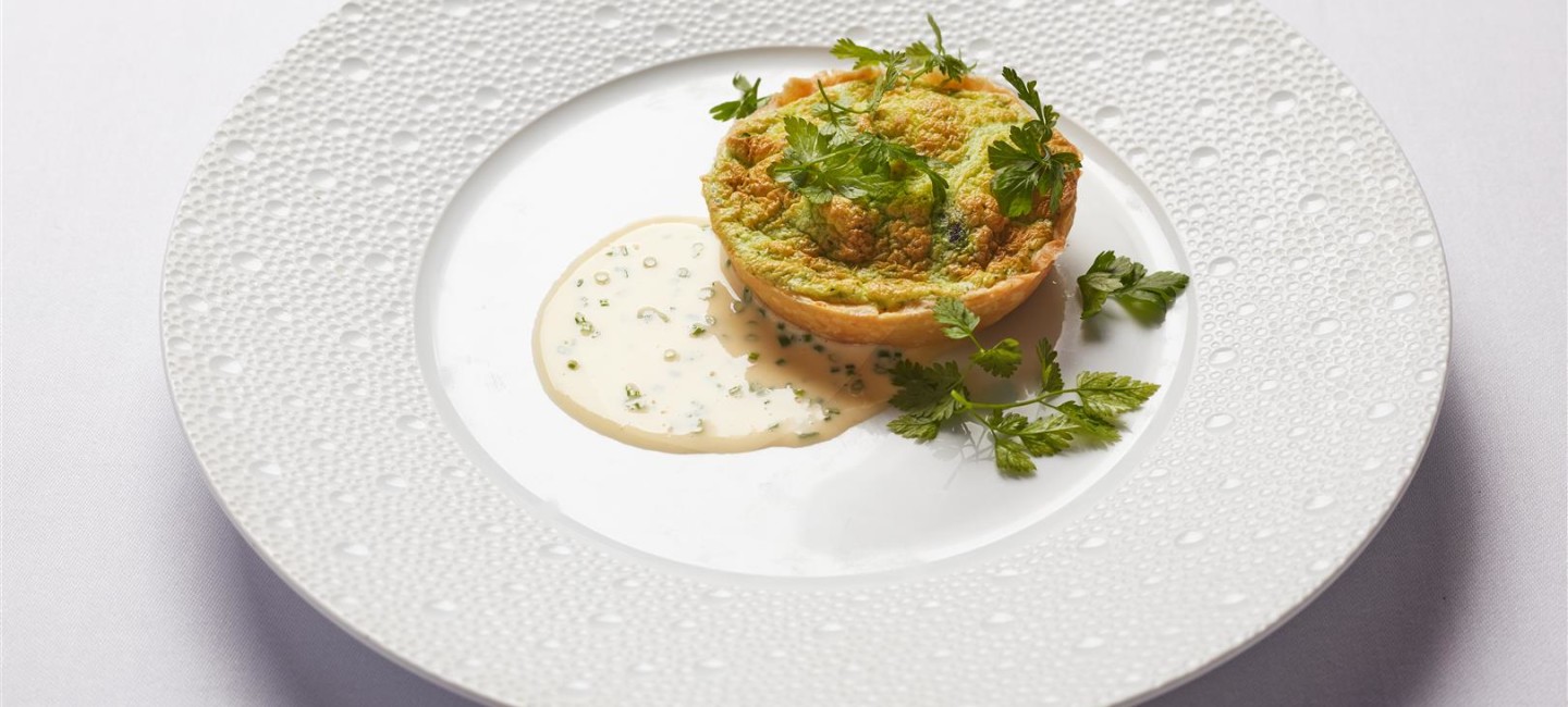 Oli Williamsons snails and herb souffle baked in a tartlet with beurre blanc sauce Large