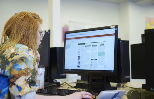 Digital Marketing apprentice working on a computer