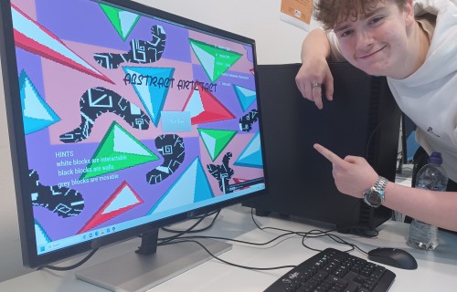 Hayden Mullinger with his puzzle based platform game Abstract Artefact. Pic credit Dorian Cozens