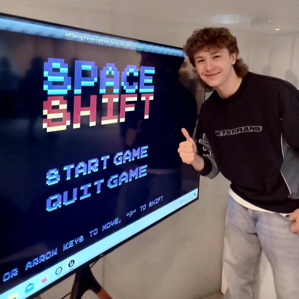Leo Walsh with his Space Shift game at the play test at the Sainsbury Centre.