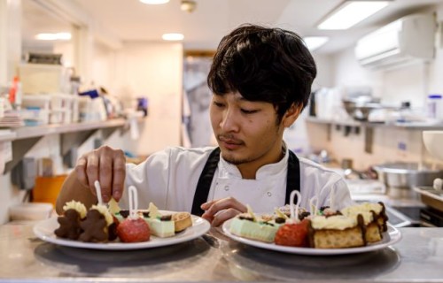 Student Patsakorn Thitisap working at the Great Fosters hotel in Surrey